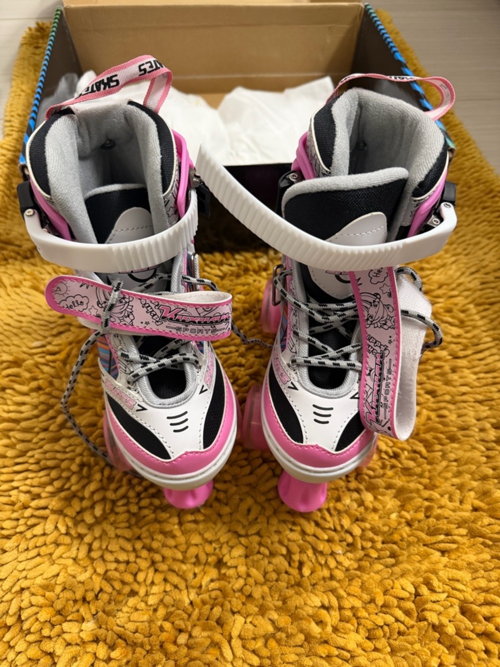 Girls Adjustable Pink and White Roller Skates in size Small (9 to 12)